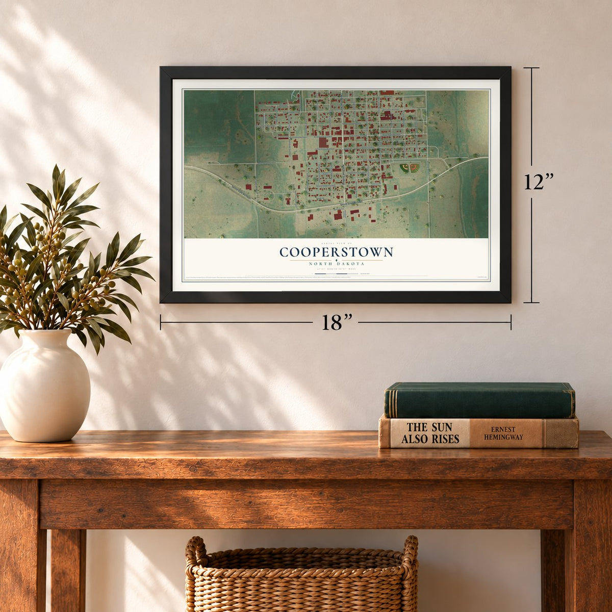 Cooperstown, North Dakota map, 12 x 18 inch print in a black frame in an entryway
