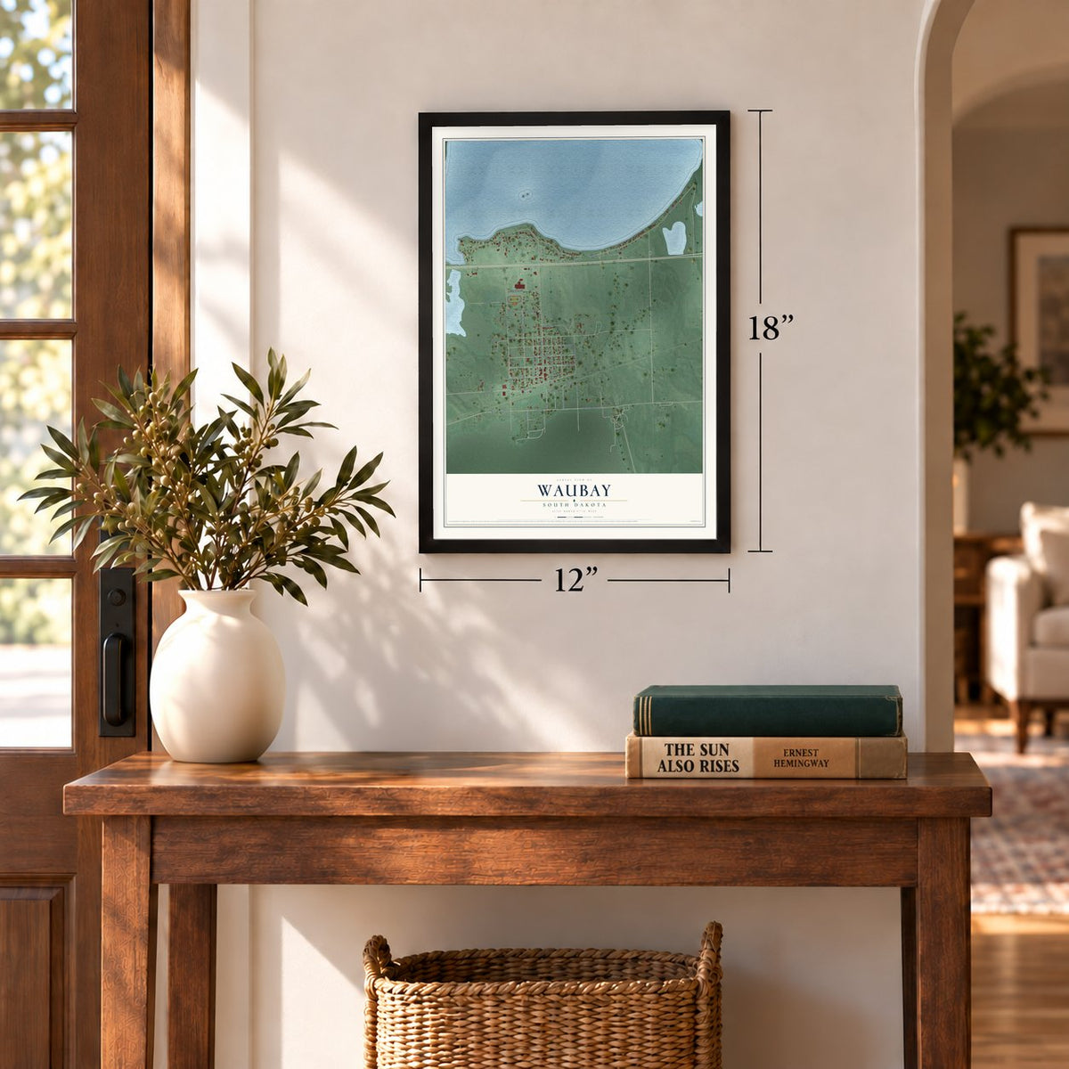 Waubay, South Dakota map, 12 x 18 inch print in a black frame in an entryway