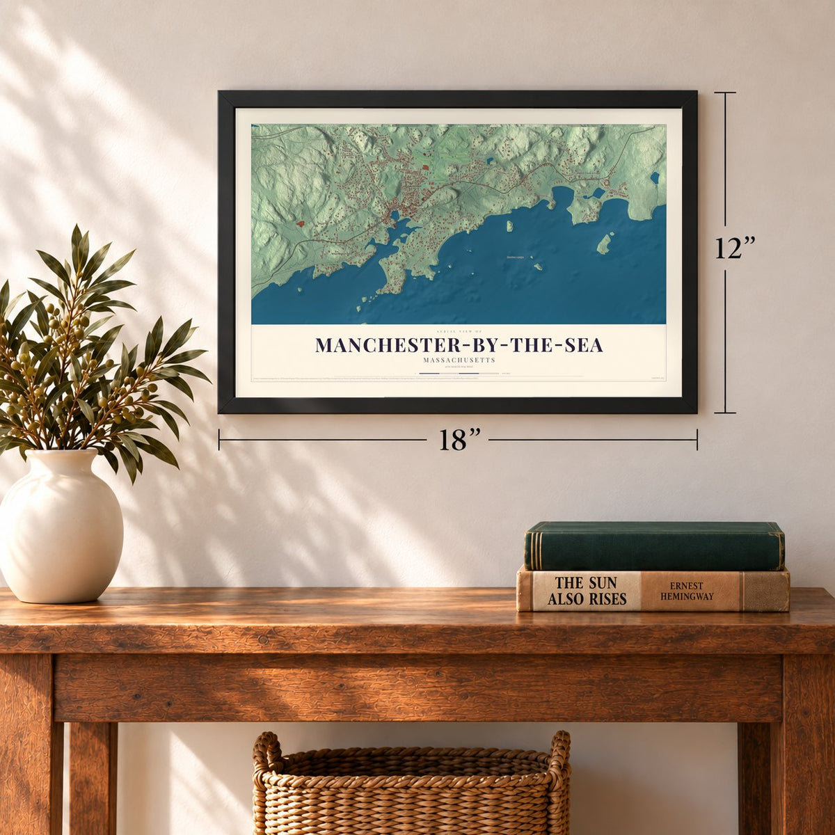 Manchester-by-the-Sea, Massachusetts map, 12 x 18 inch print in a black frame in an entryway