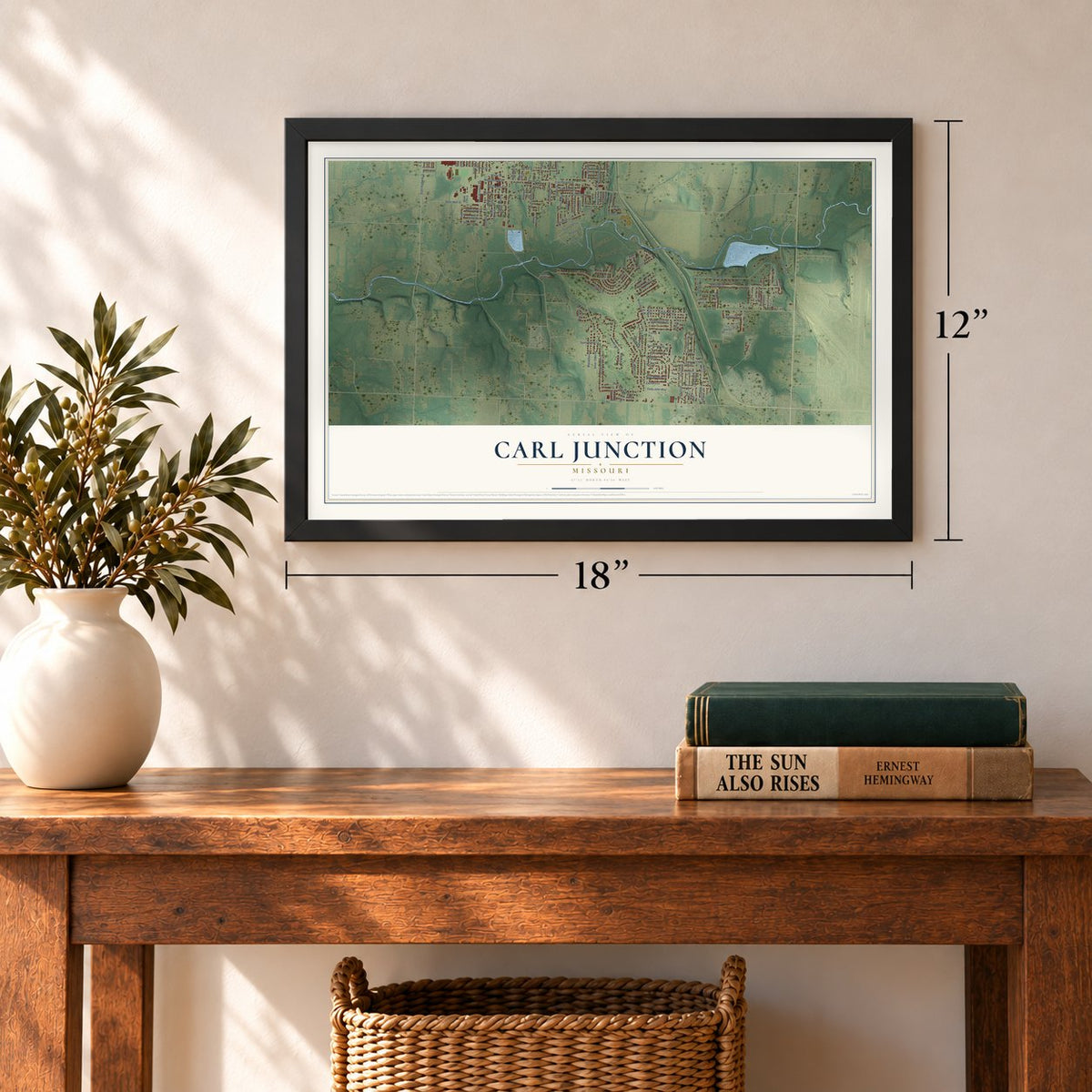Carl Junction, Missouri map, 12 x 18 inch print in a black frame in an entryway
