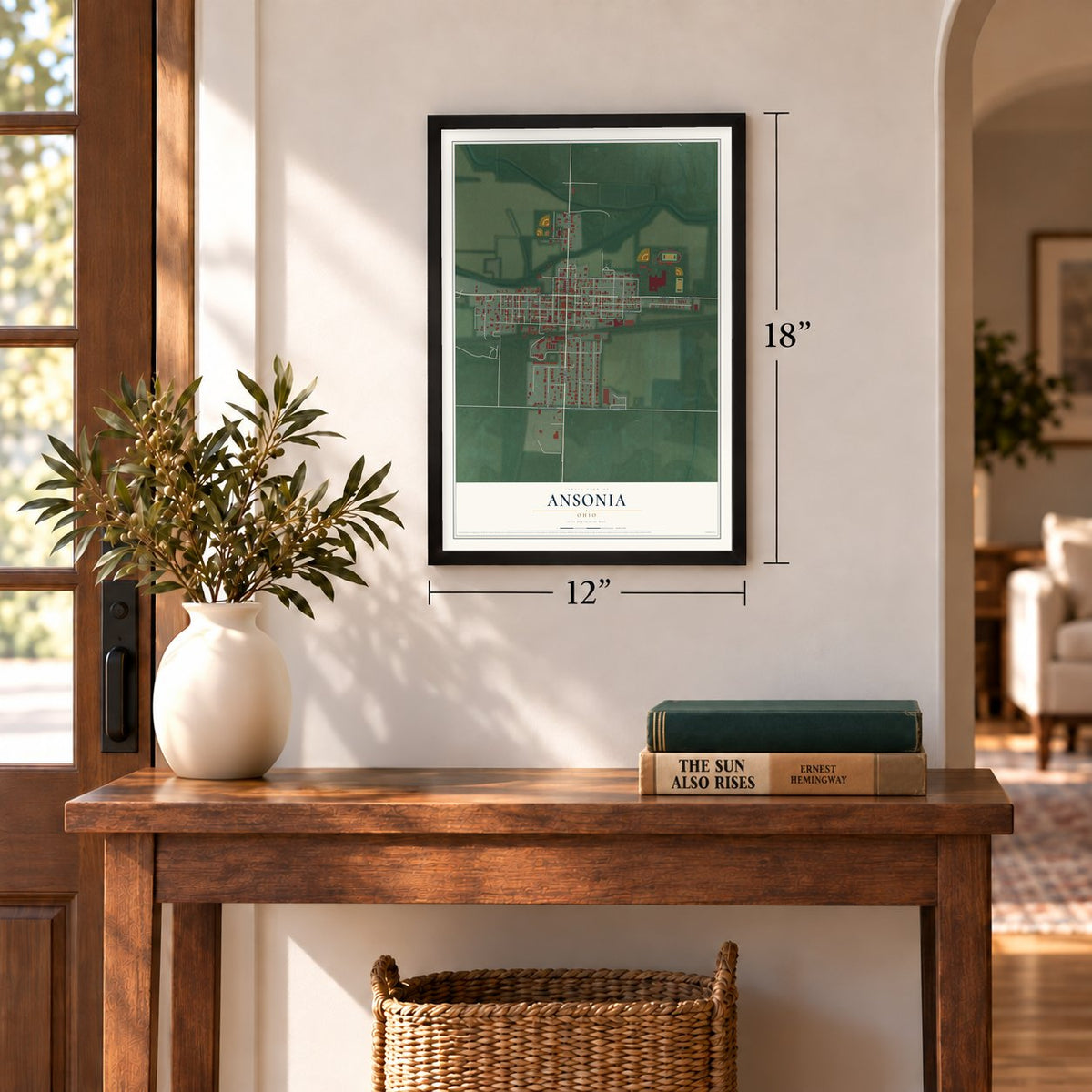 Ansonia, Ohio map, 12 x 18 inch print in a black frame in an entryway