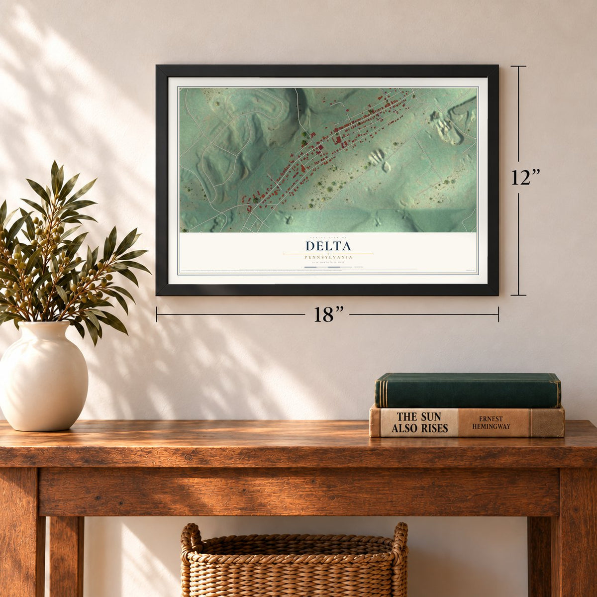 Delta, Pennsylvania map, 12 x 18 inch print in a black frame in an entryway