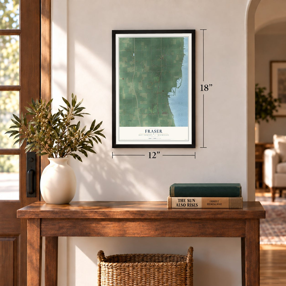 Fraser, Bay County, Michigan map, 12 x 18 inch print in a black frame in an entryway