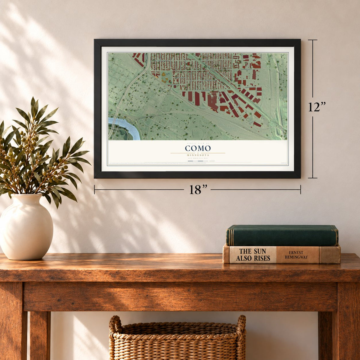 Como, Minnesota map, 12 x 18 inch print in a black frame in an entryway