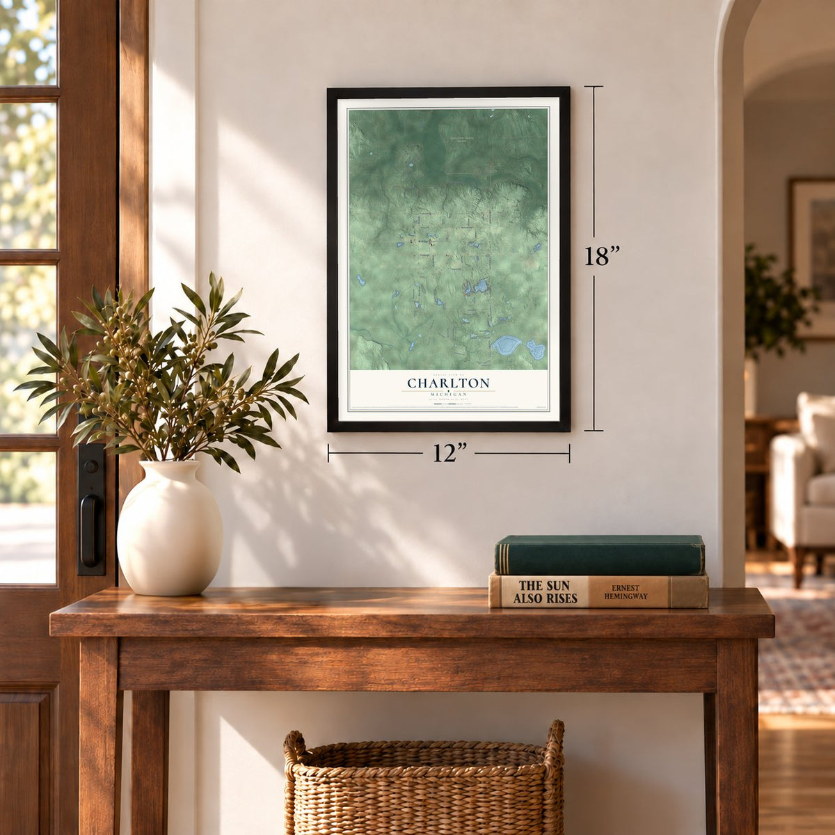 Charlton, Michigan map, 12 x 18 inch print in a black frame in an entryway