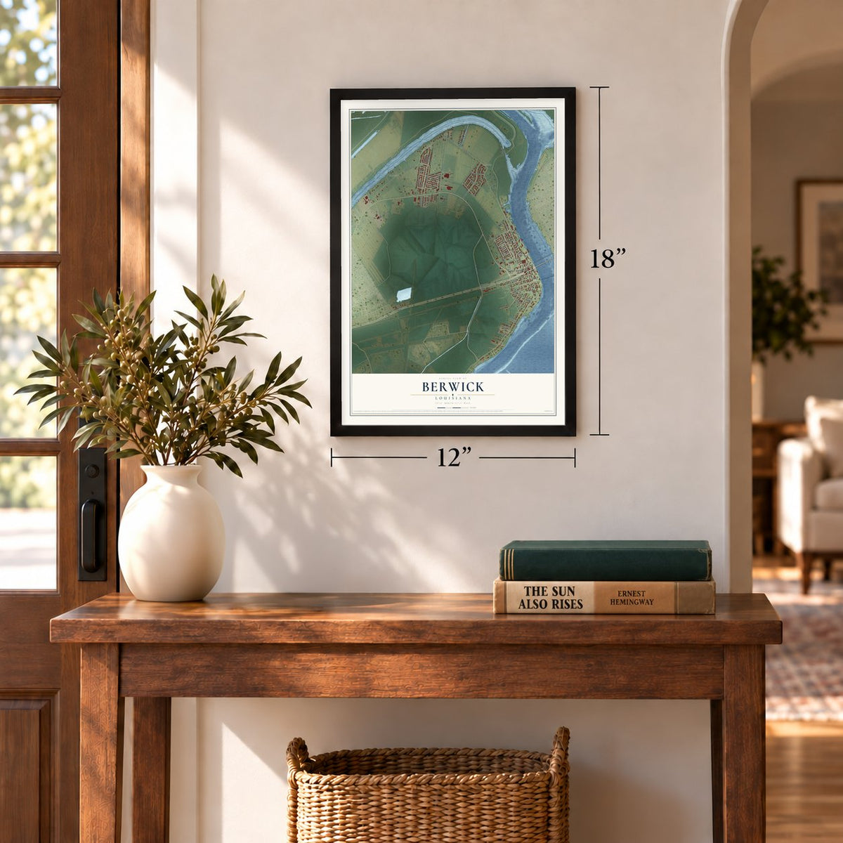 Berwick, Louisiana map, 12 x 18 inch print in a black frame in an entryway