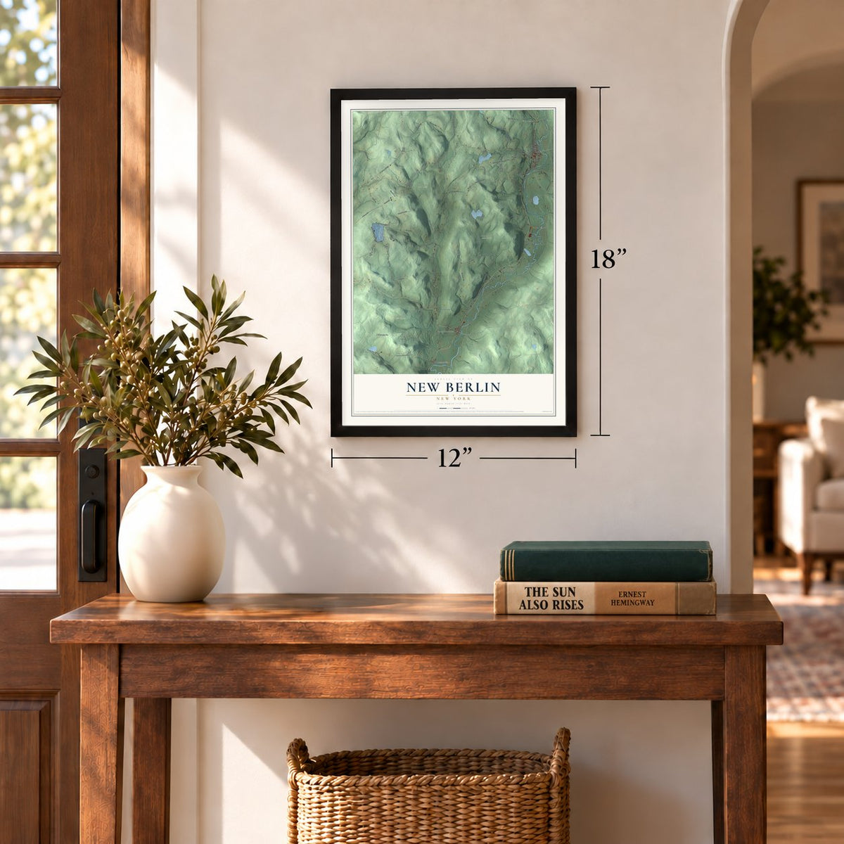 New Berlin, New York map, 12 x 18 inch print in a black frame in an entryway