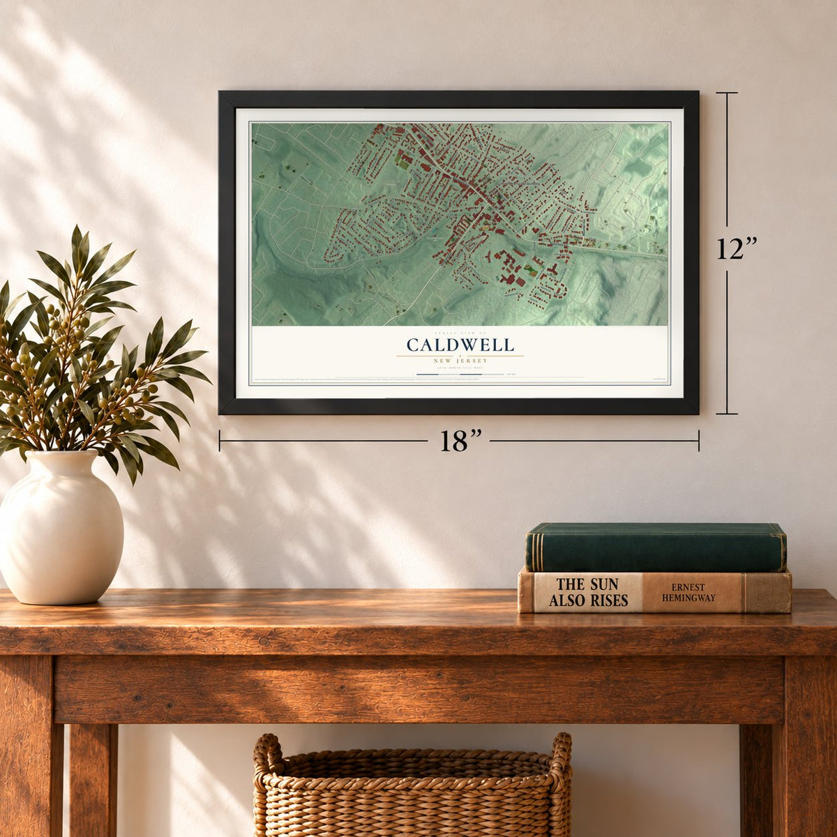 Caldwell, New Jersey map, 12 x 18 inch print in a black frame in an entryway