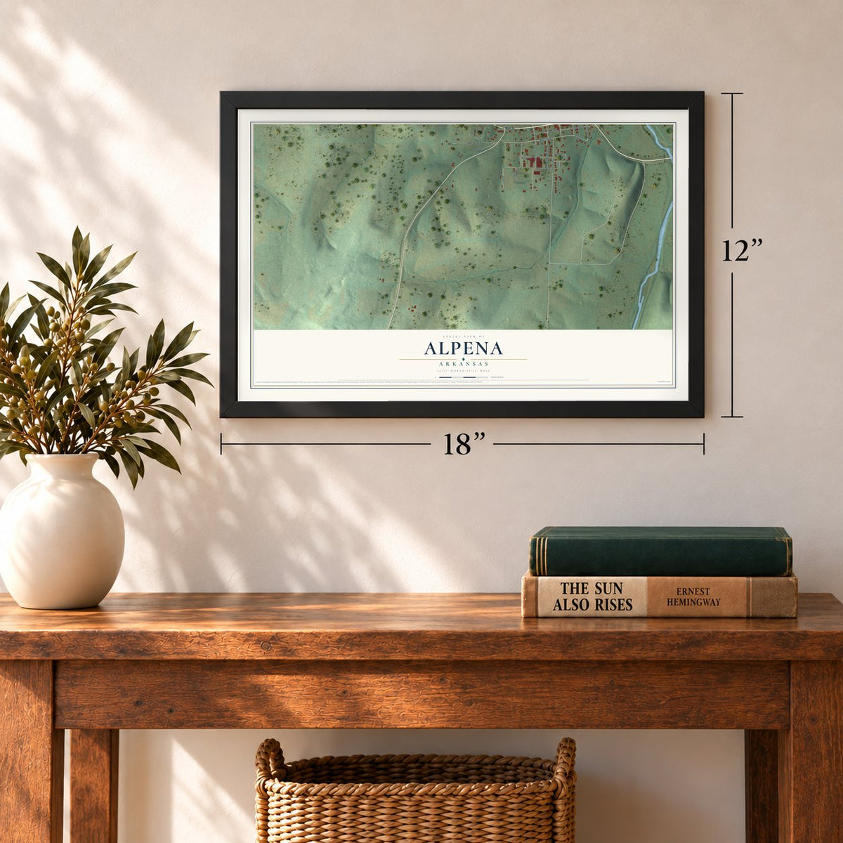 Alpena, Arkansas map, 12 x 18 inch print in a black frame in an entryway