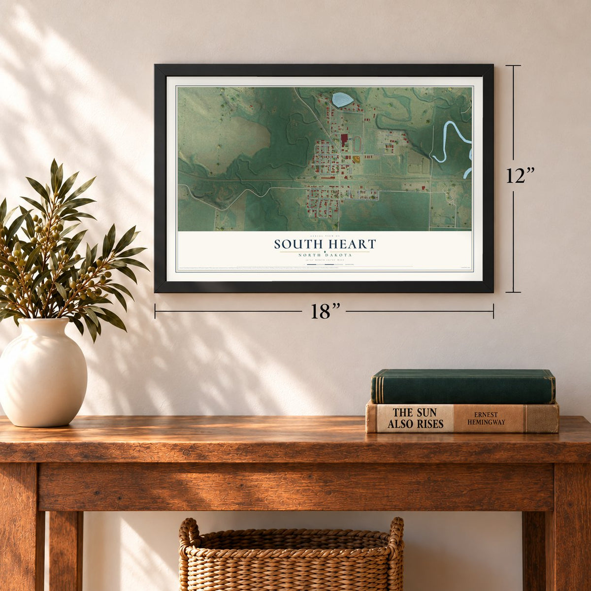 South Heart, North Dakota map, 12 x 18 inch print in a black frame in an entryway