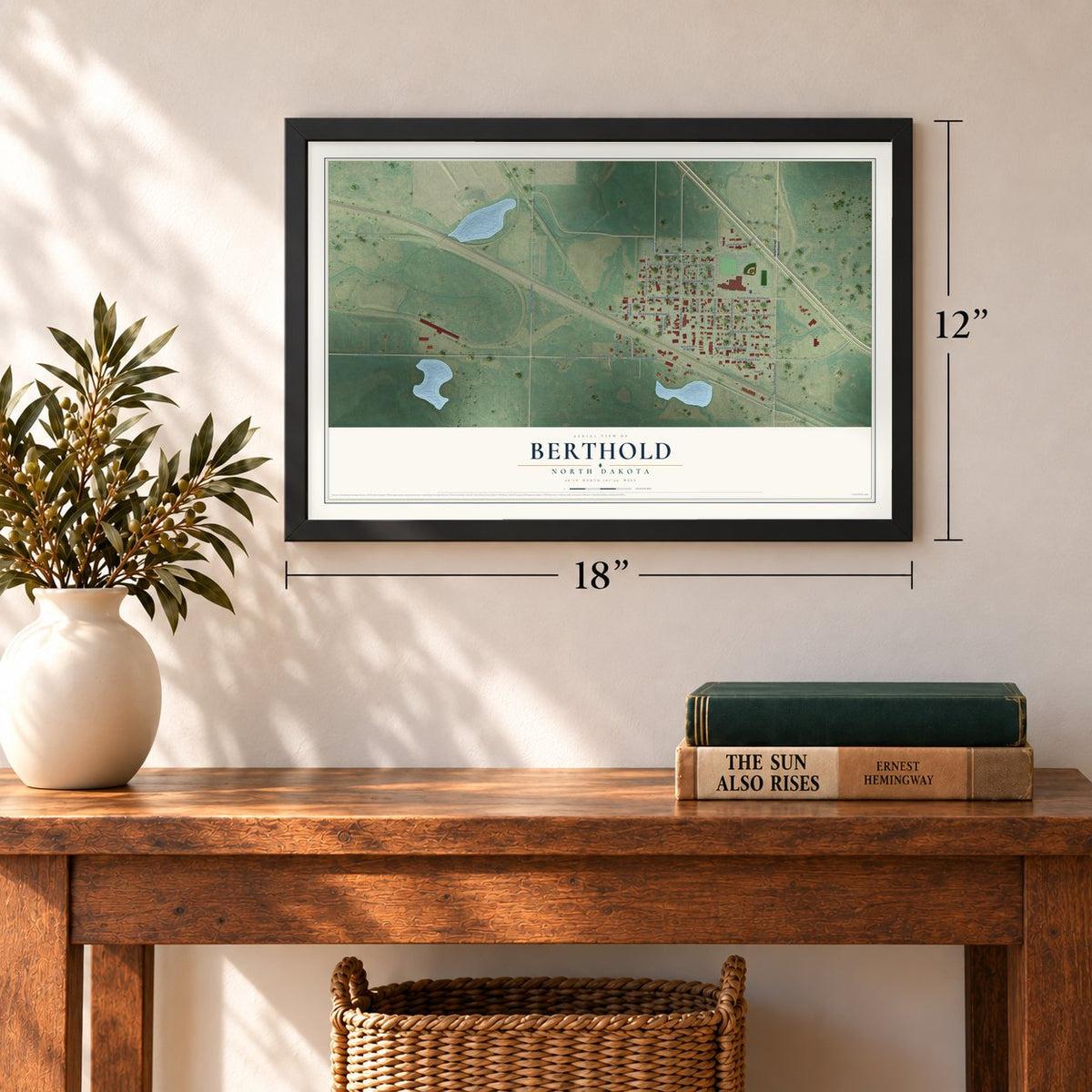 Berthold, North Dakota map, 12 x 18 inch print in a black frame in an entryway