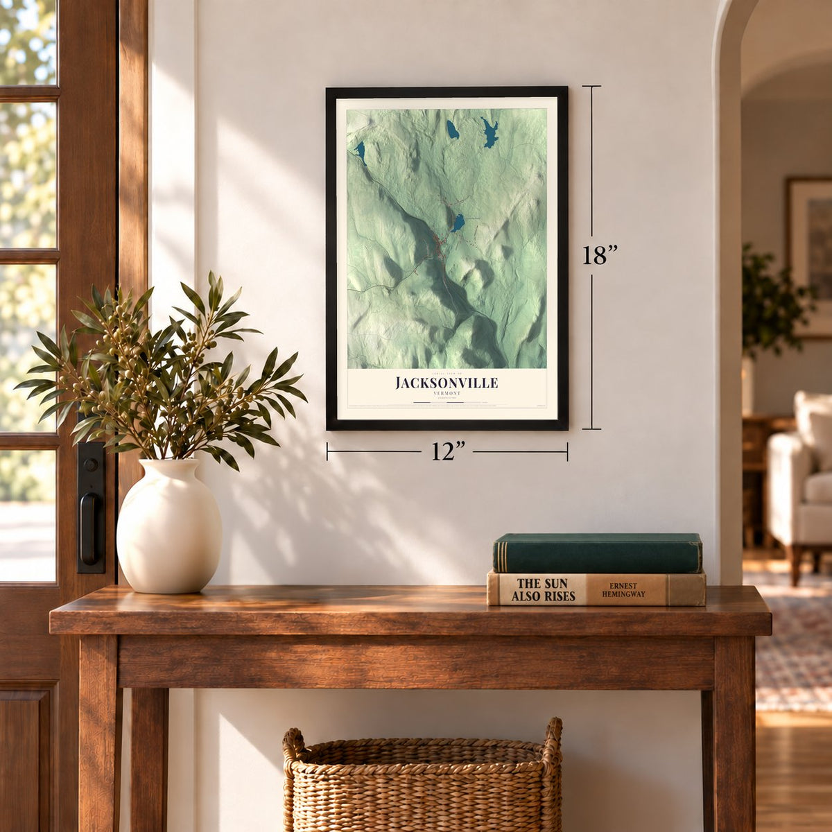 Jacksonville, Vermont map, 12 x 18 inch print in a black frame in an entryway