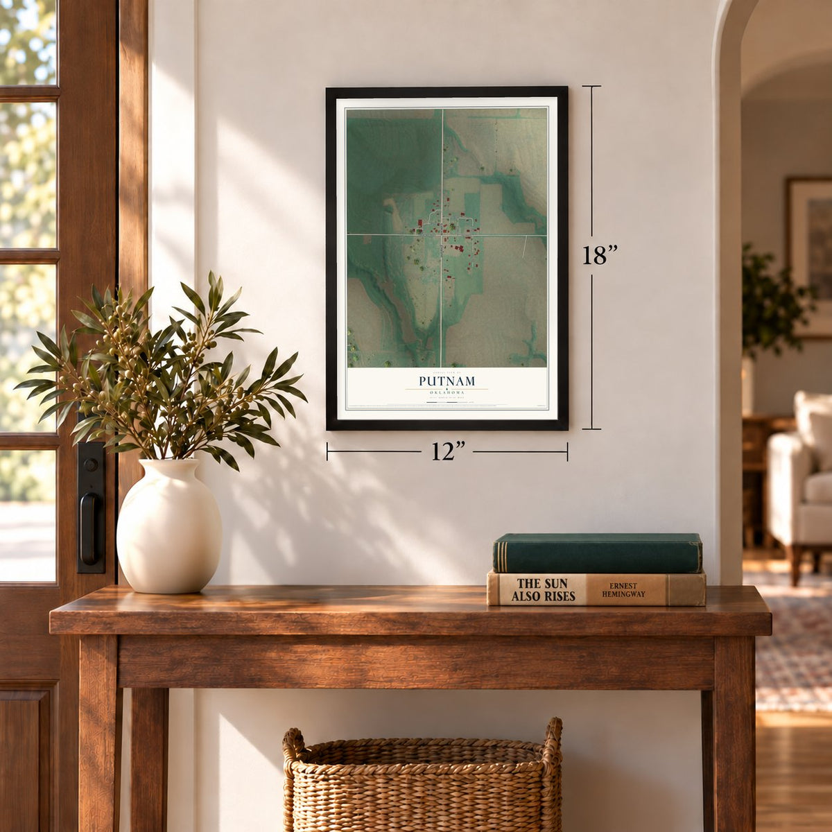 Putnam, Oklahoma map, 12 x 18 inch print in a black frame in an entryway