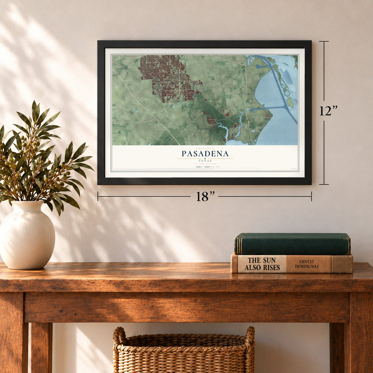 Pasadena, Texas map, 12 x 18 inch print in a black frame in an entryway