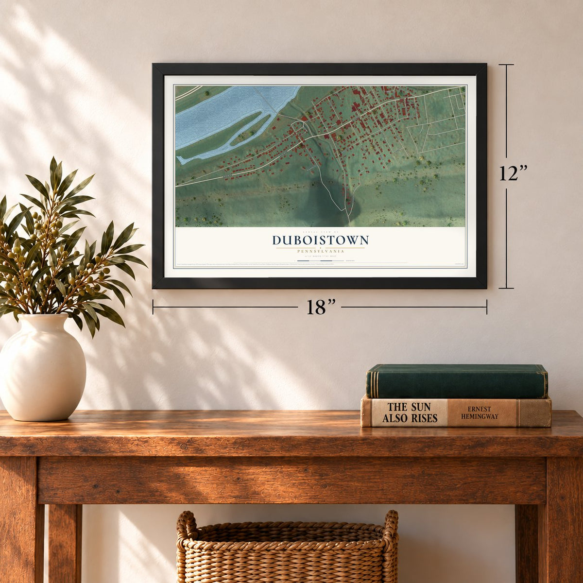 Duboistown, Pennsylvania map, 12 x 18 inch print in a black frame in an entryway