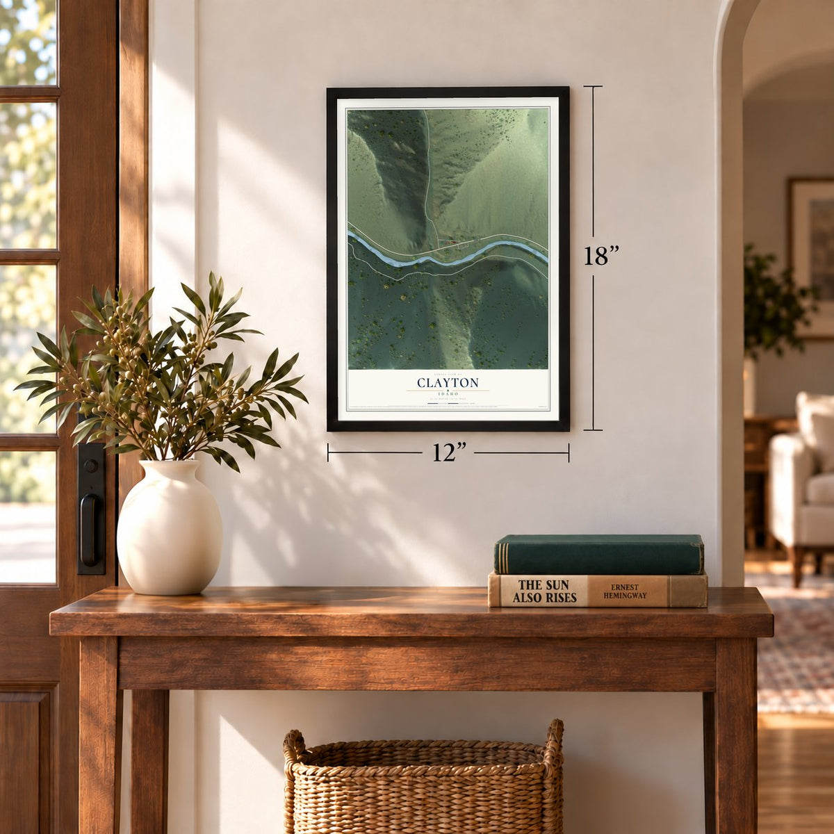 Clayton, Idaho map, 12 x 18 inch print in a black frame in an entryway