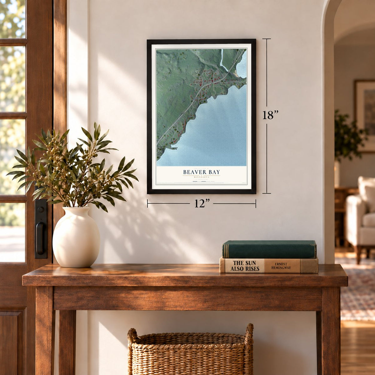 Beaver Bay, Minnesota map, 12 x 18 inch print in a black frame in an entryway