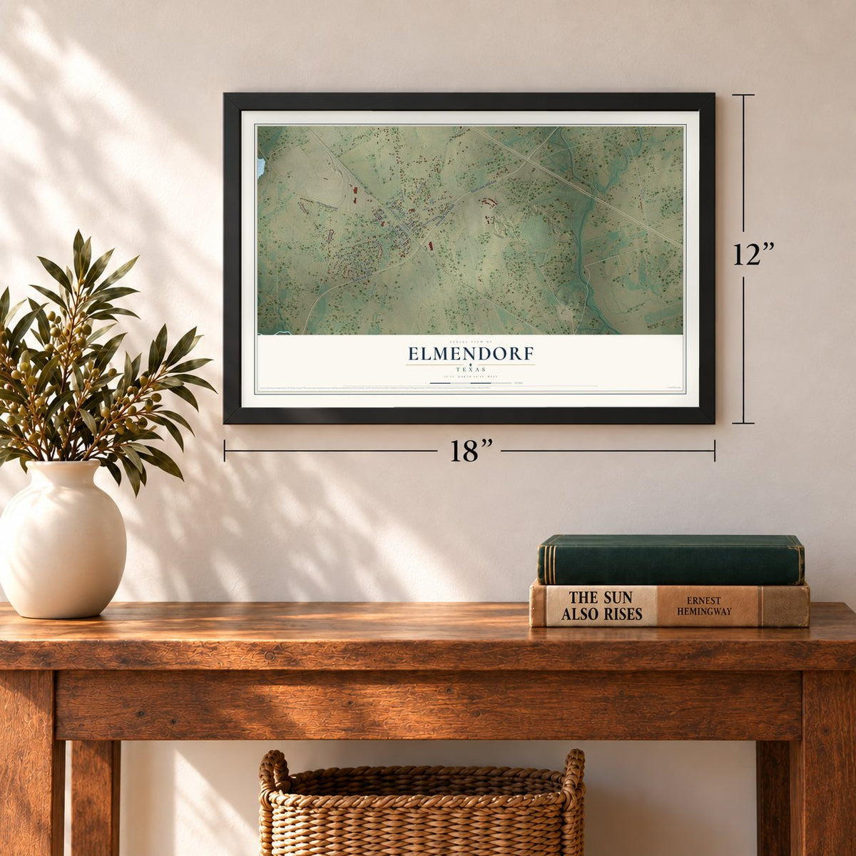 Elmendorf, Texas map, 12 x 18 inch print in a black frame in an entryway