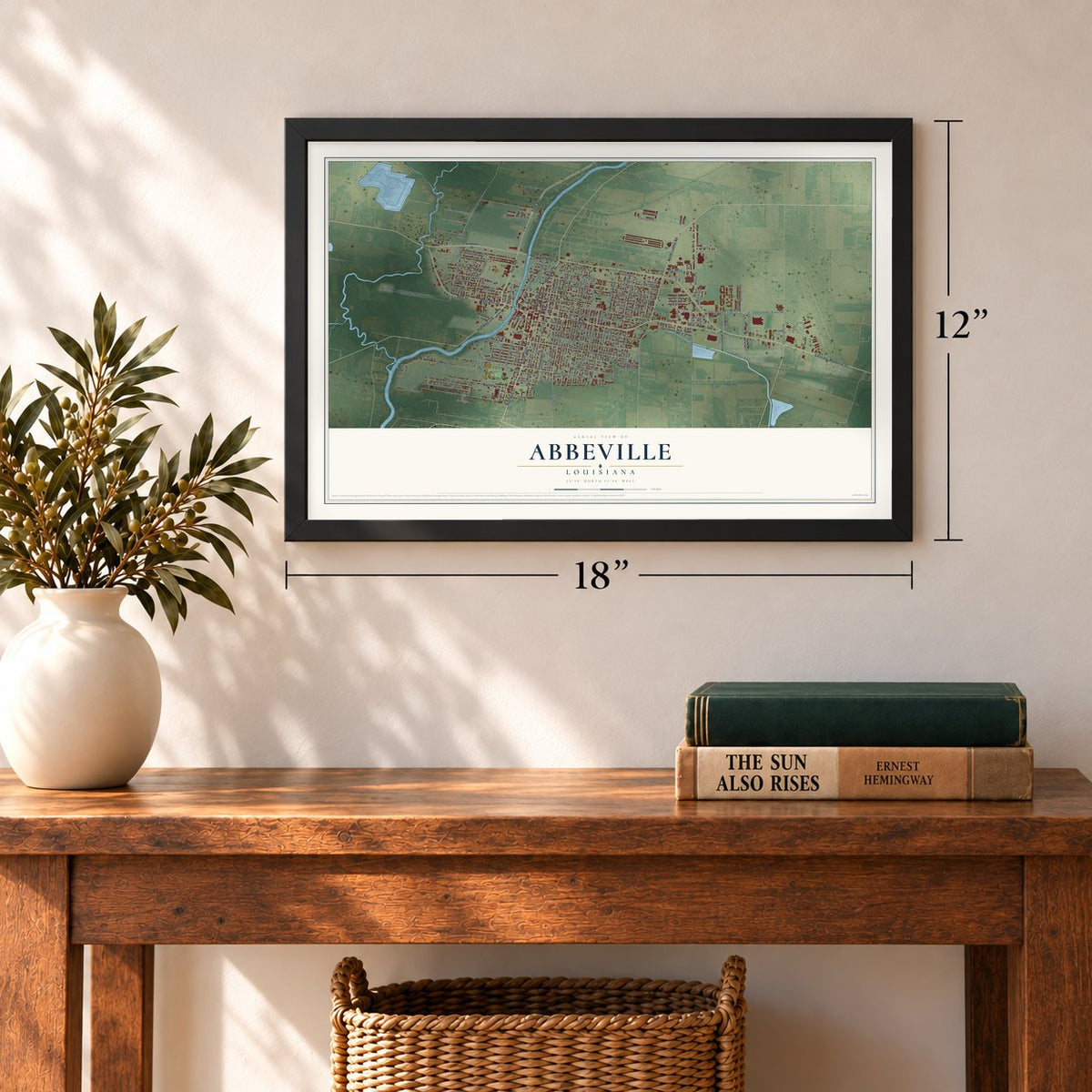 Abbeville, Louisiana map, 12 x 18 inch print in a black frame in an entryway