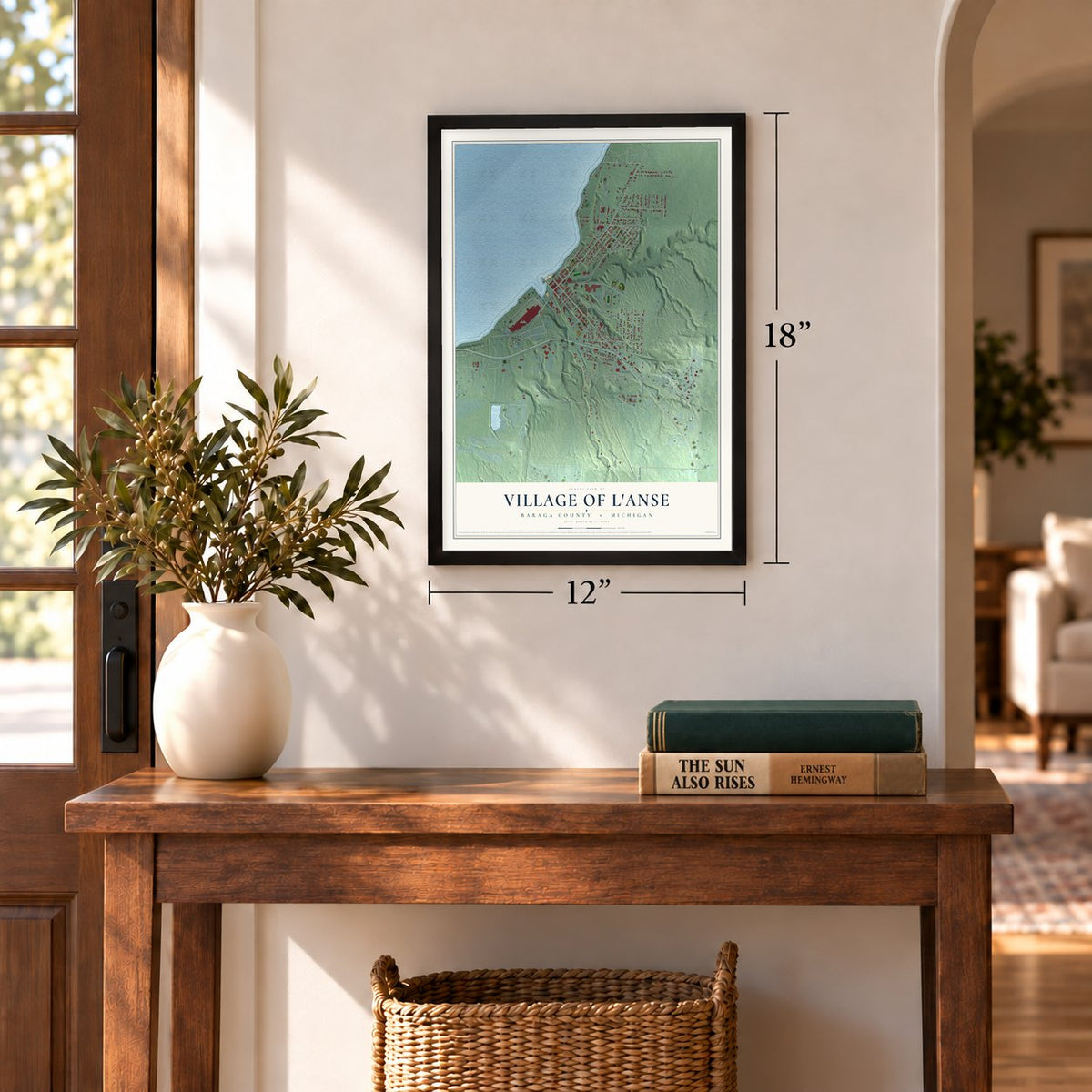 L'Anse, Michigan map, 12 x 18 inch print in a black frame in an entryway