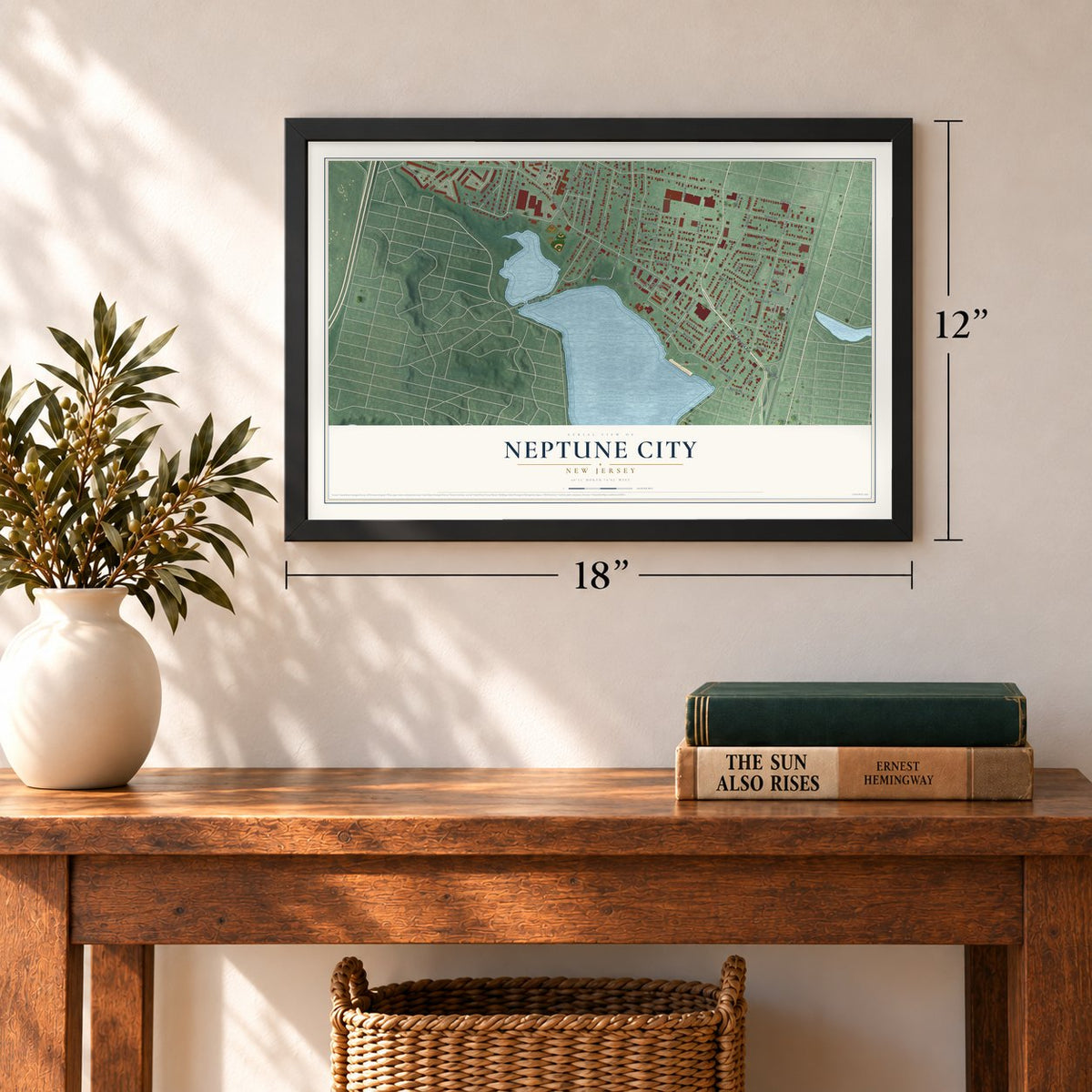 Neptune City, New Jersey map, 12 x 18 inch print in a black frame in an entryway