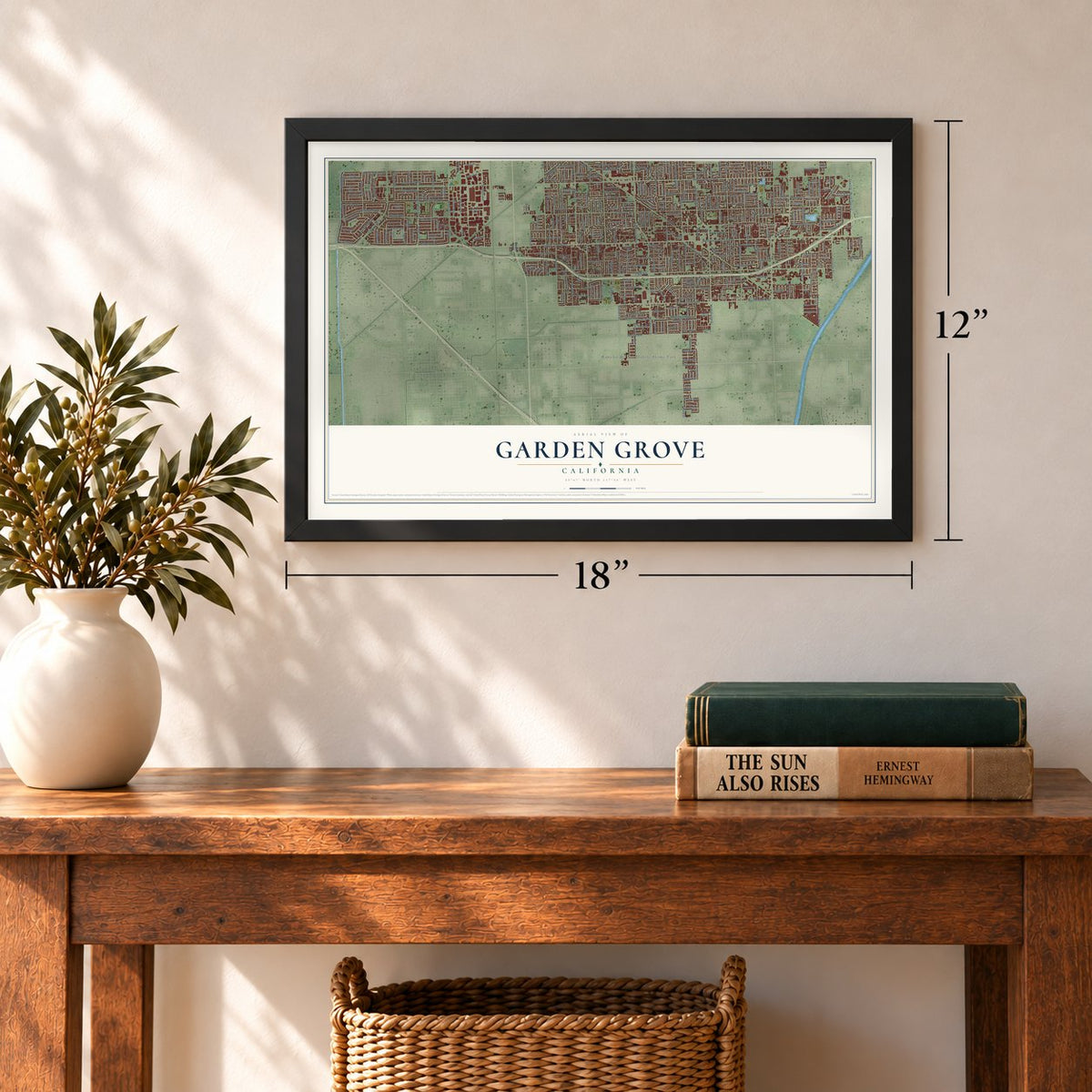 Garden Grove, California map, 12 x 18 inch print in a black frame in an entryway