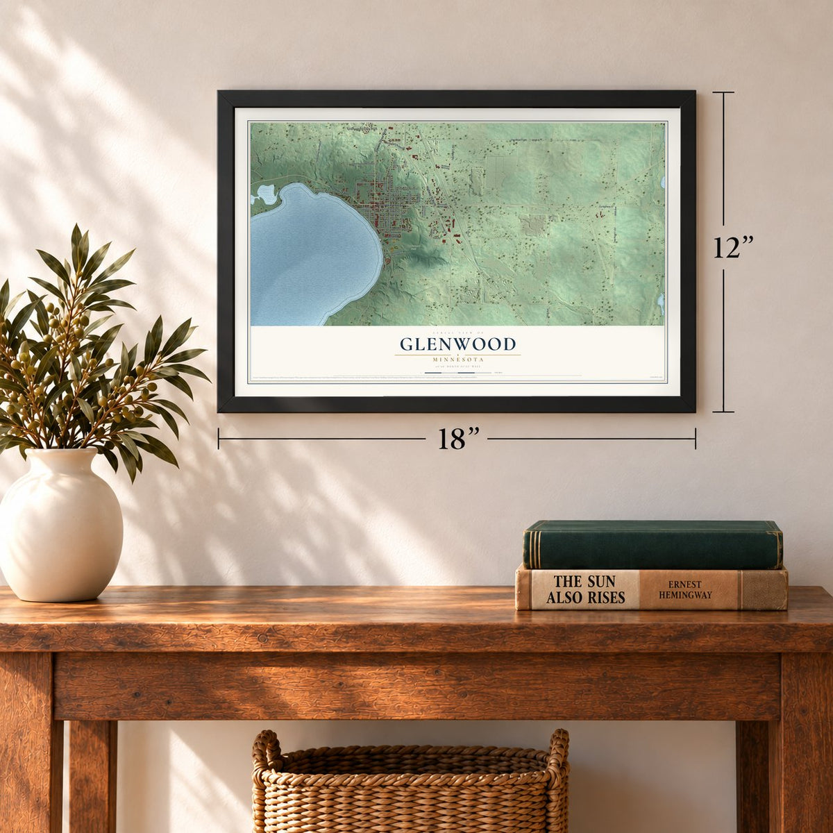Glenwood, Minnesota map, 12 x 18 inch print in a black frame in an entryway
