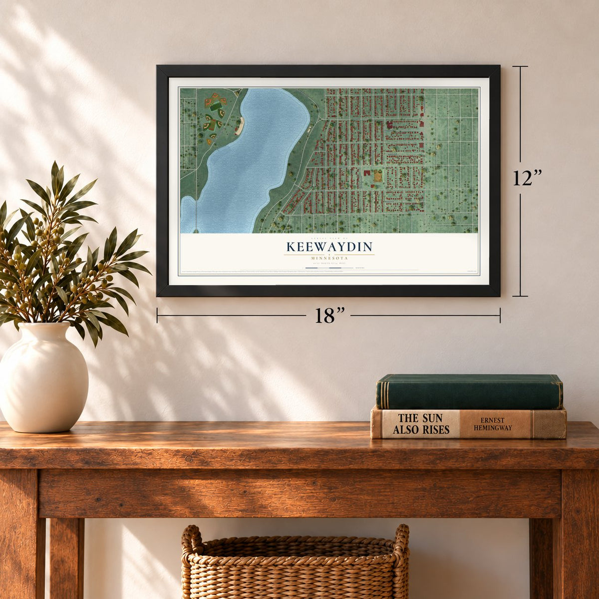 Keewaydin, Minnesota map, 12 x 18 inch print in a black frame in an entryway