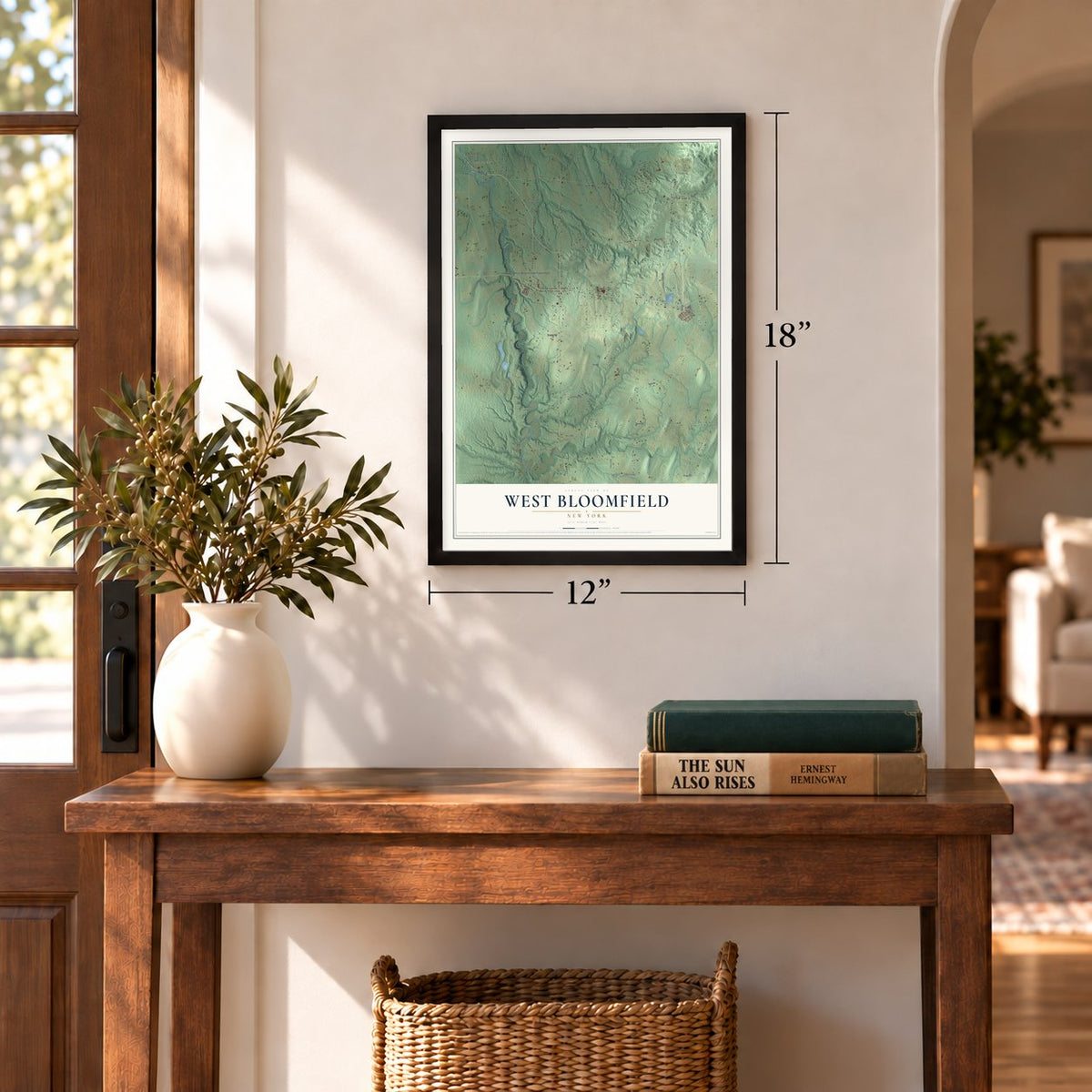 West Bloomfield, New York map, 12 x 18 inch print in a black frame in an entryway
