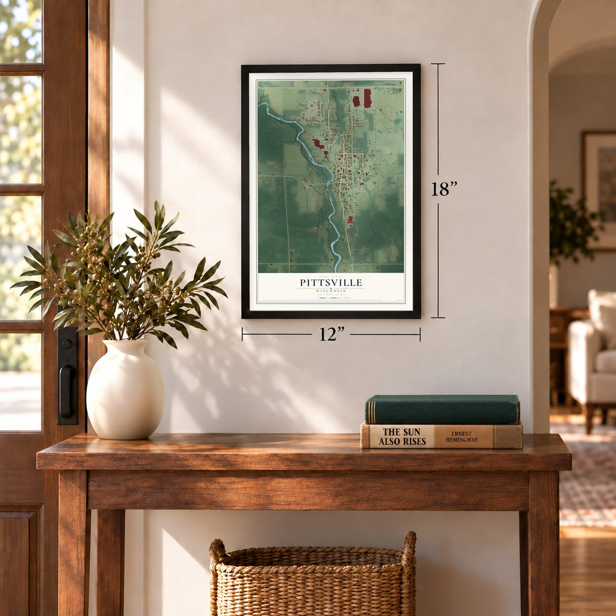 Pittsville, Wisconsin map, 12 x 18 inch print in a black frame in an entryway