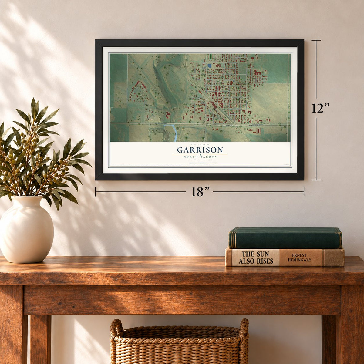 Garrison, North Dakota map, 12 x 18 inch print in a black frame in an entryway