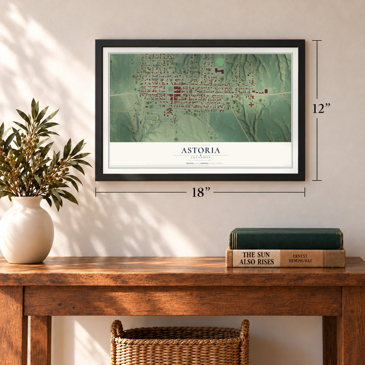Astoria, Illinois map, 12 x 18 inch print in a black frame in an entryway
