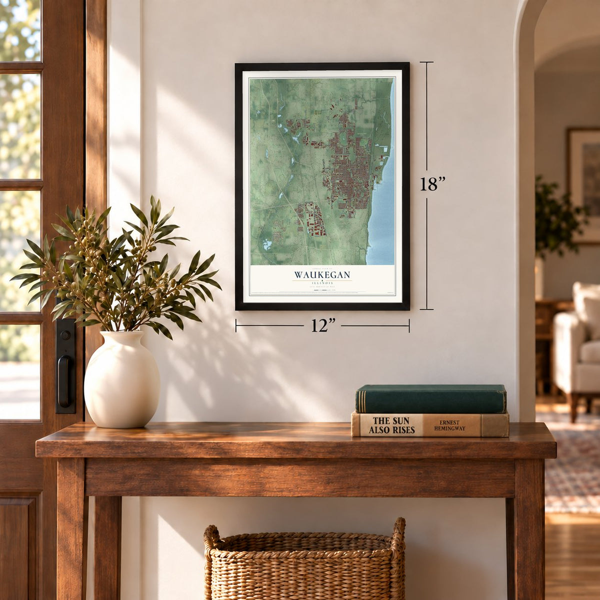 Waukegan, Illinois map, 12 x 18 inch print in a black frame in an entryway