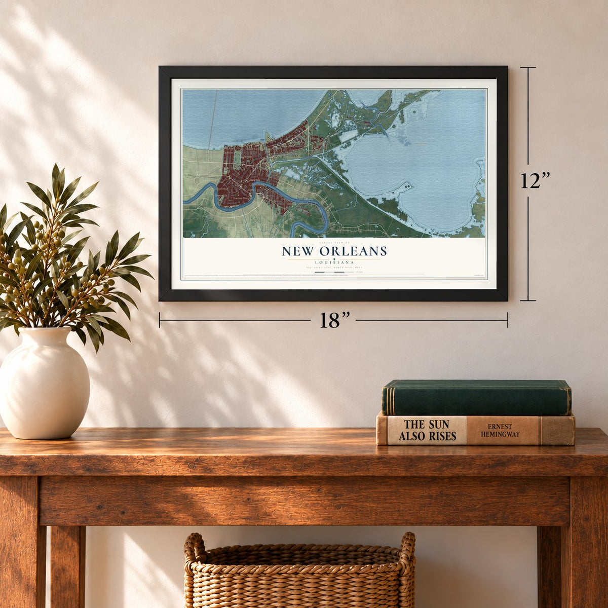 New Orleans, Louisiana map, 12 x 18 inch print in a black frame in an entryway