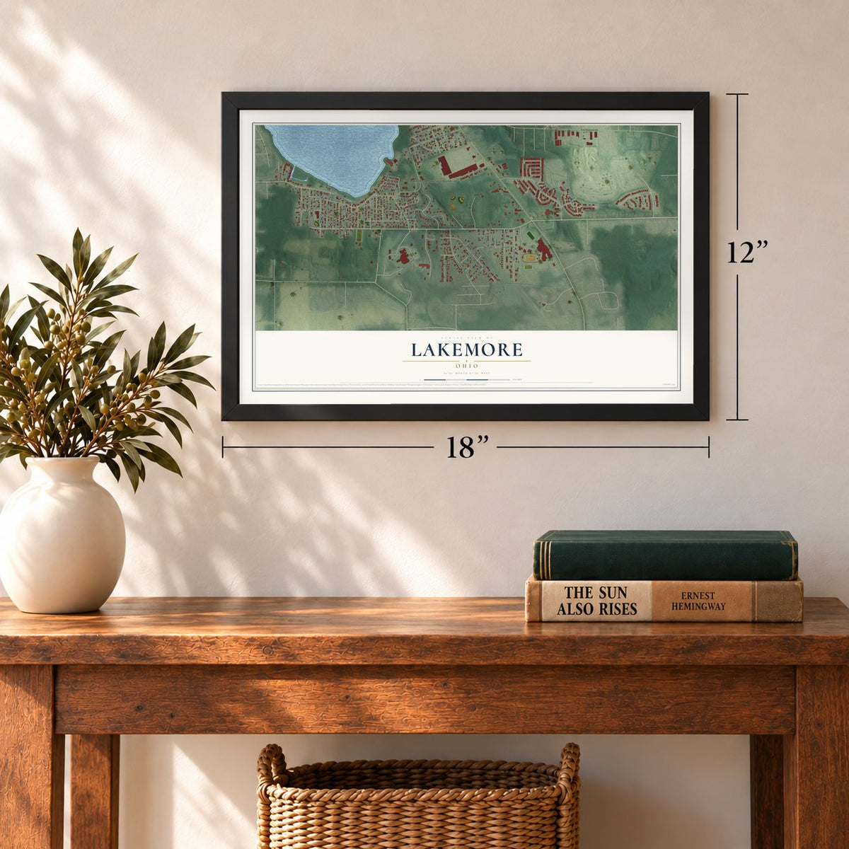 Lakemore, Ohio map, 12 x 18 inch print in a black frame in an entryway