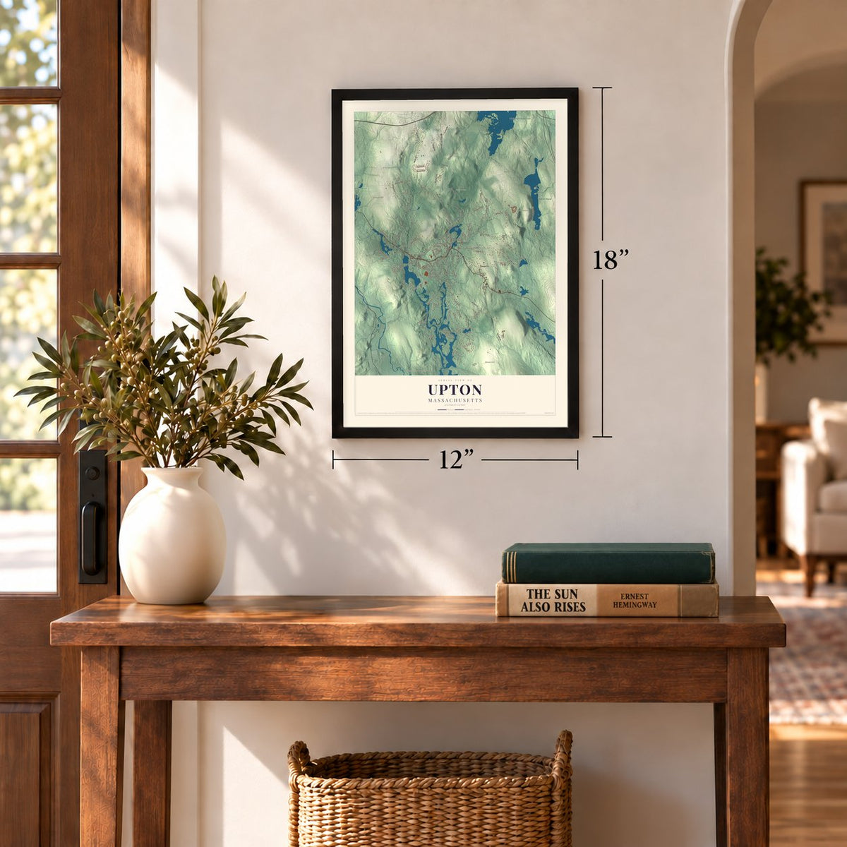 Upton, Massachusetts map, 12 x 18 inch print in a black frame in an entryway