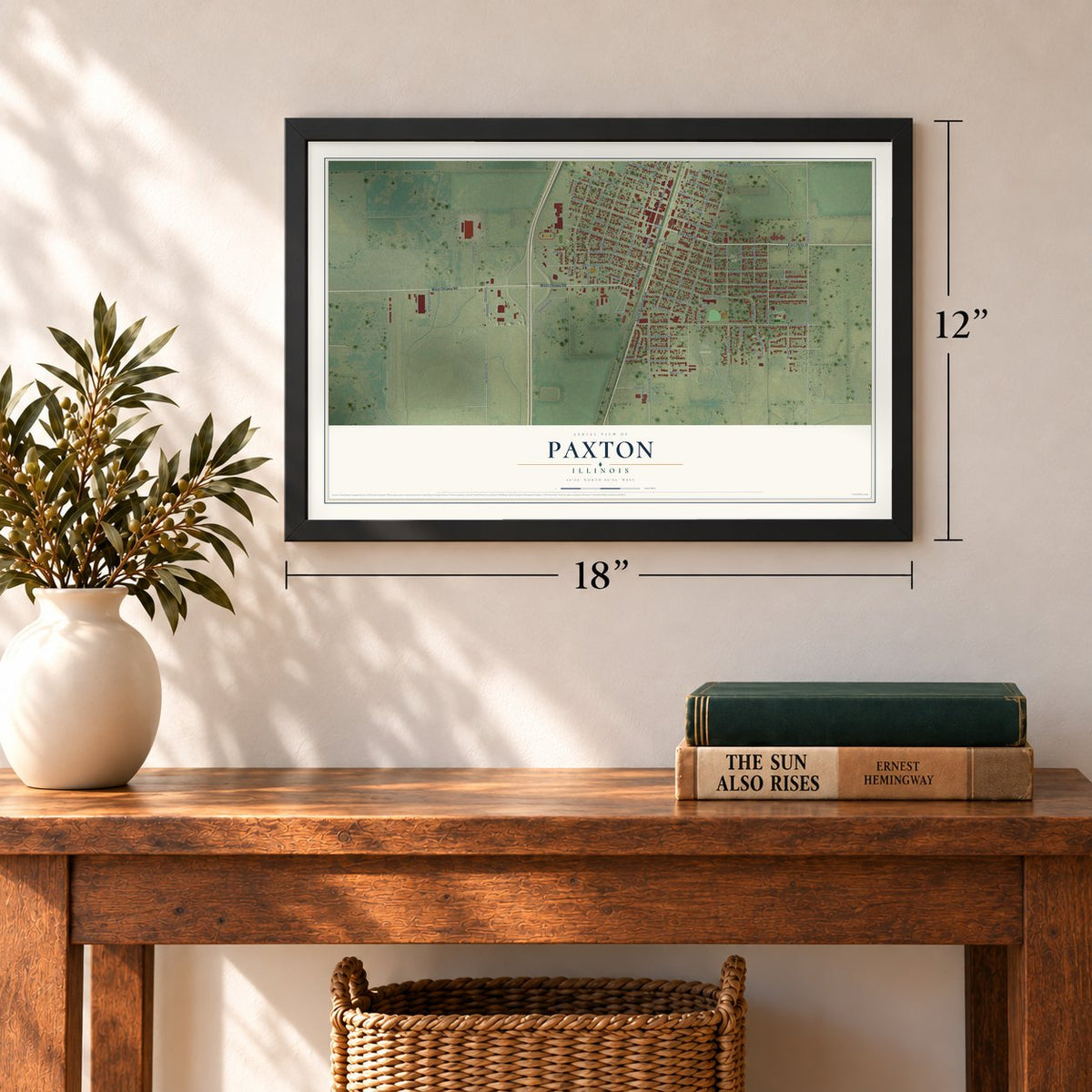 Paxton, Illinois map, 12 x 18 inch print in a black frame in an entryway