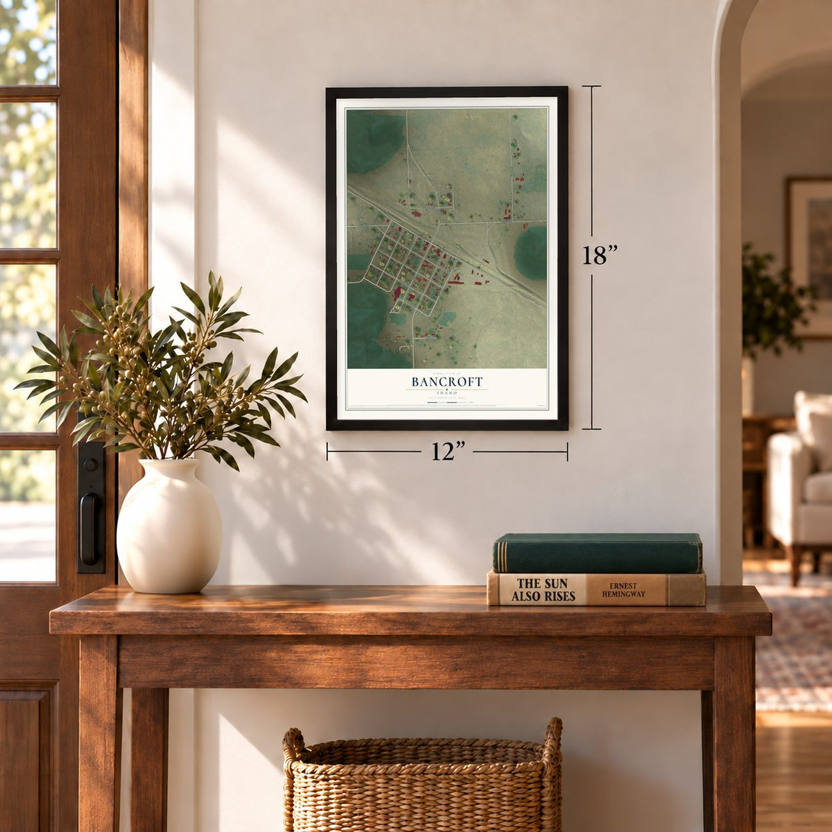 Bancroft, Idaho map, 12 x 18 inch print in a black frame in an entryway