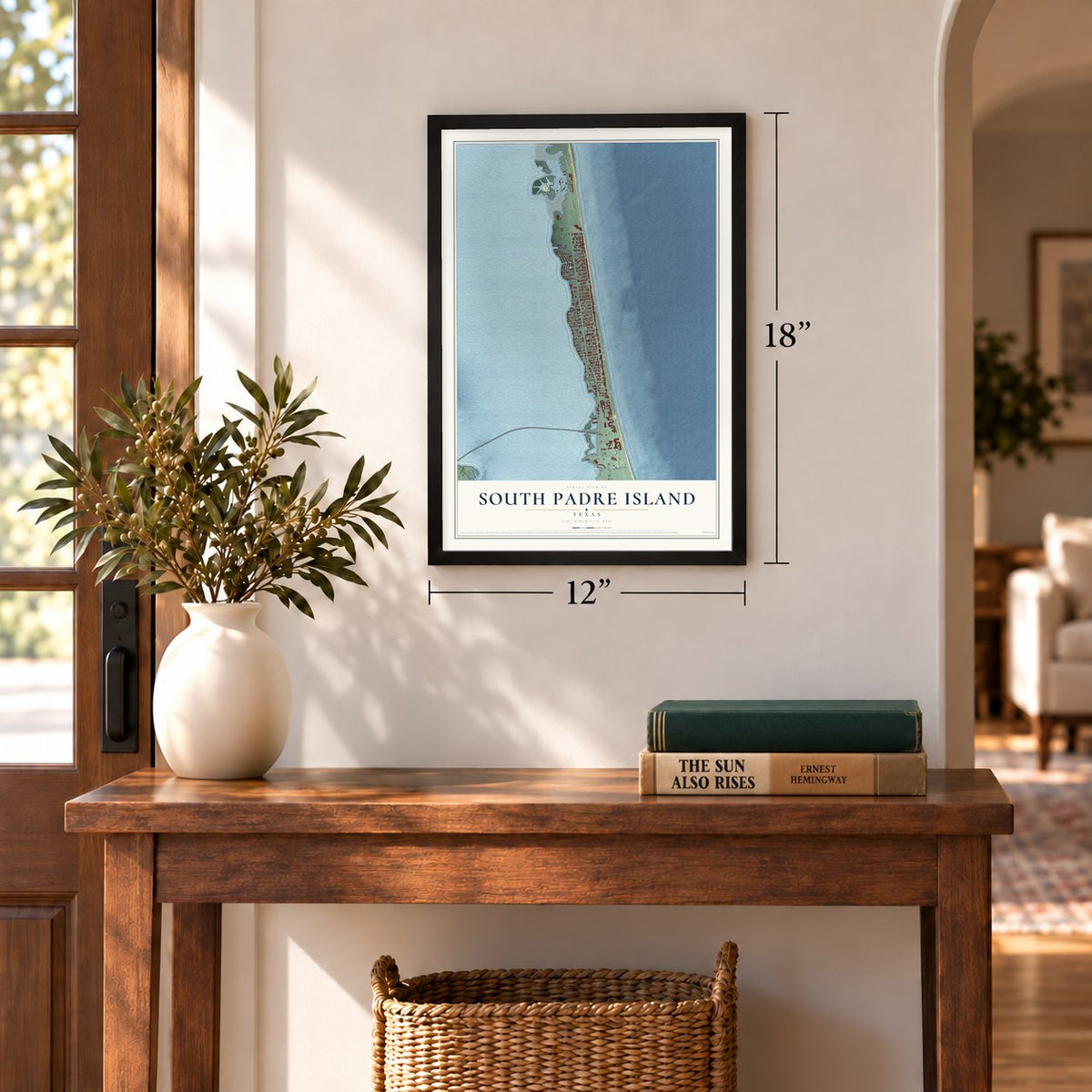 South Padre Island, Texas map, 12 x 18 inch print in a black frame in an entryway