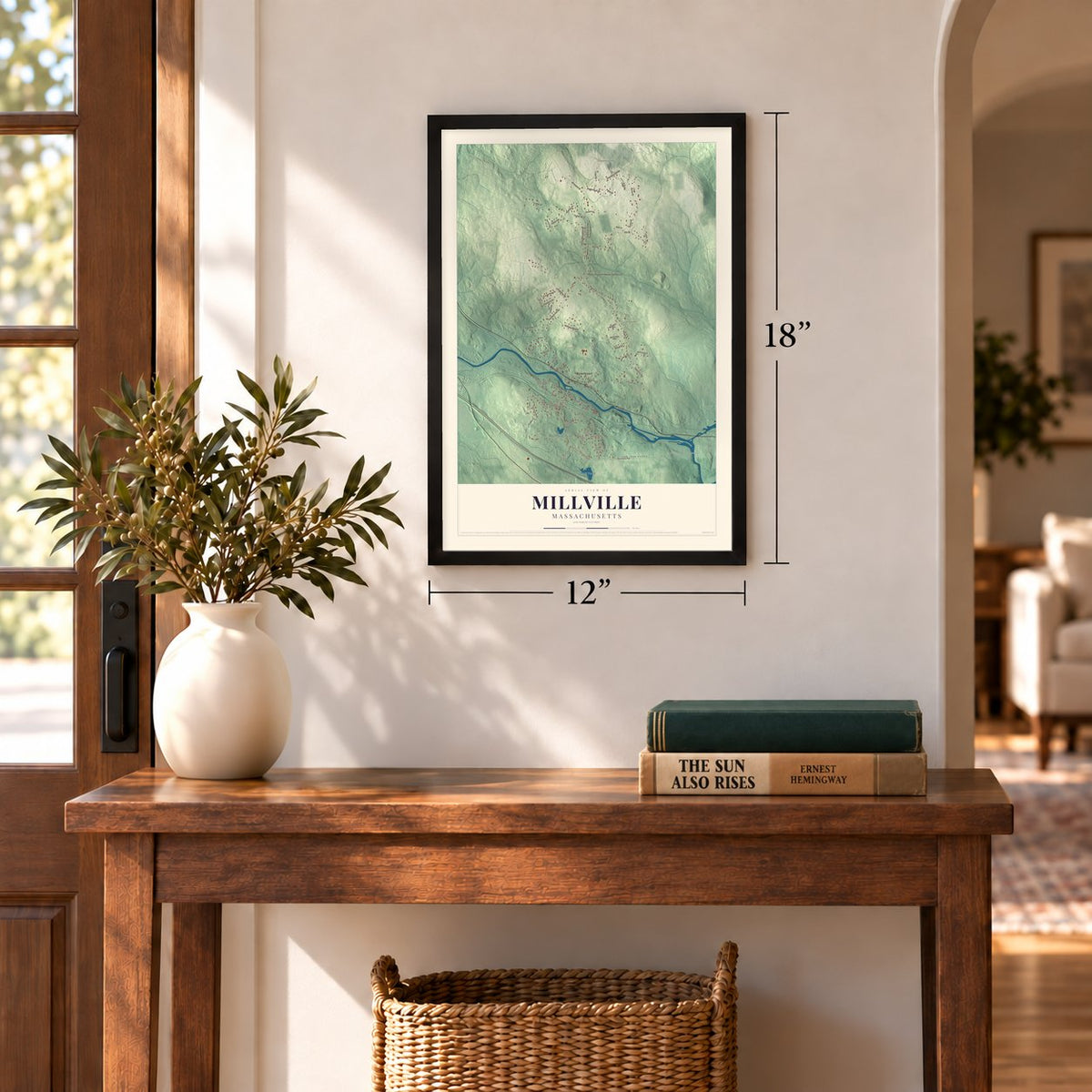 Millville, Massachusetts map, 12 x 18 inch print in a black frame in an entryway