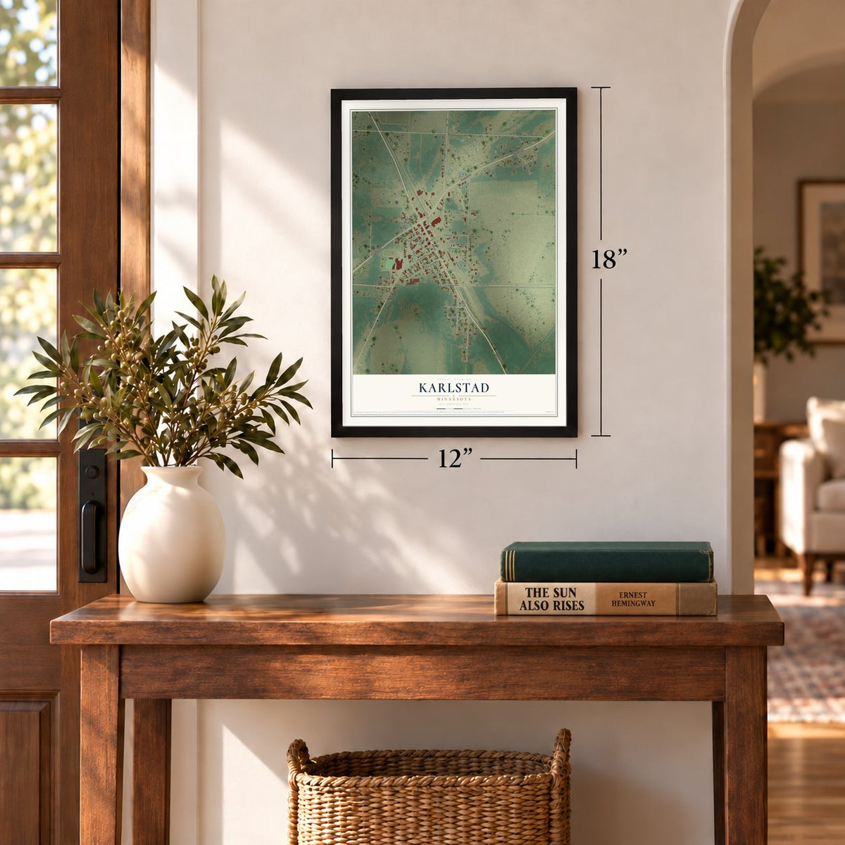 Karlstad, Minnesota map, 12 x 18 inch print in a black frame in an entryway