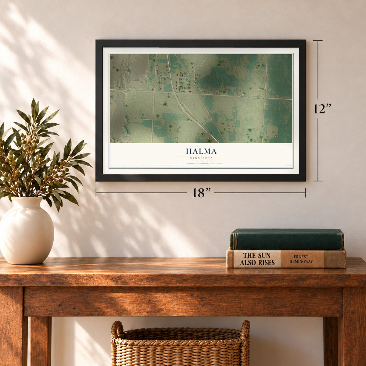 Halma, Minnesota map, 12 x 18 inch print in a black frame in an entryway