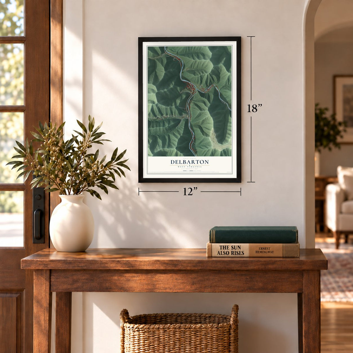 Delbarton, West Virginia map, 12 x 18 inch print in a black frame in an entryway