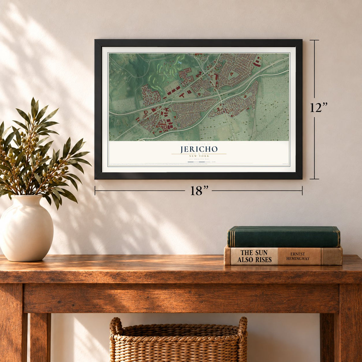 Jericho, New York map, 12 x 18 inch print in a black frame in an entryway