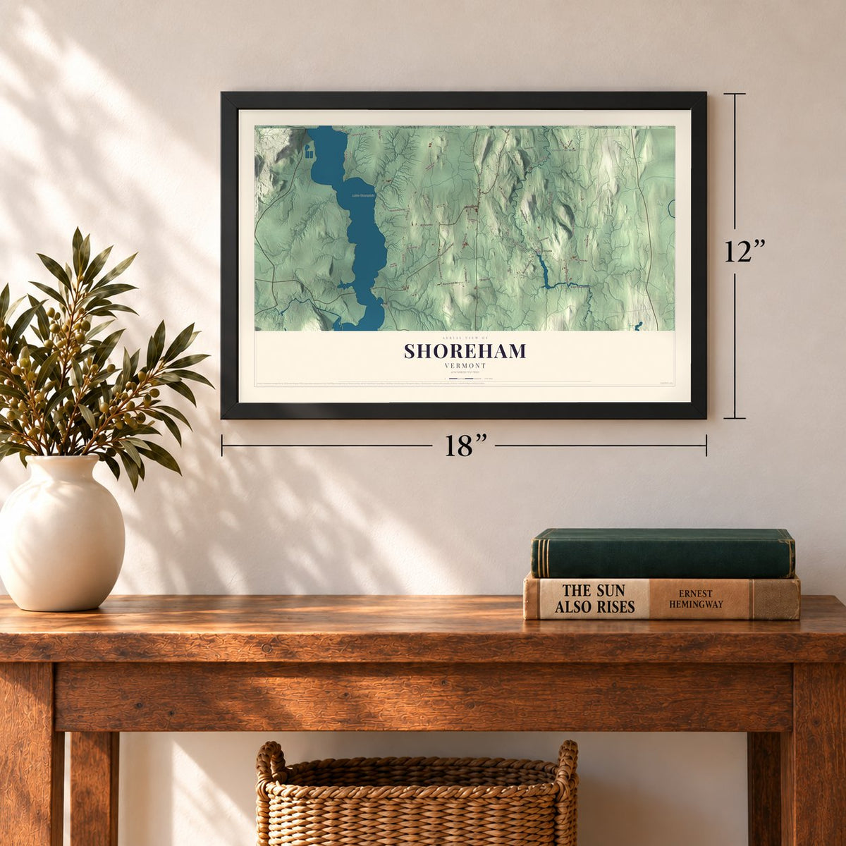 Shoreham, Vermont map, 12 x 18 inch print in a black frame in an entryway