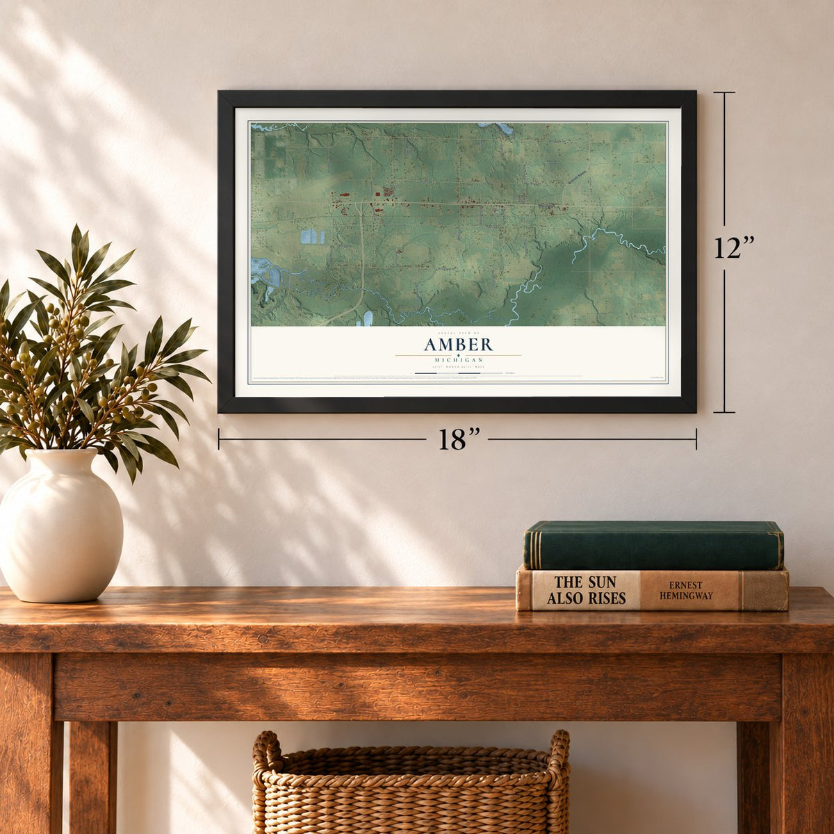 Amber, Michigan map, 12 x 18 inch print in a black frame in an entryway