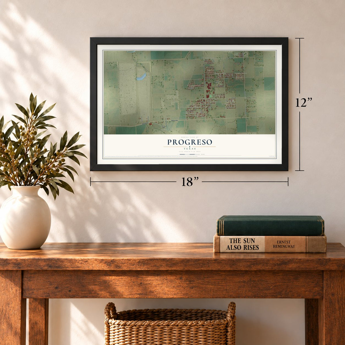 Progreso, Texas map, 12 x 18 inch print in a black frame in an entryway