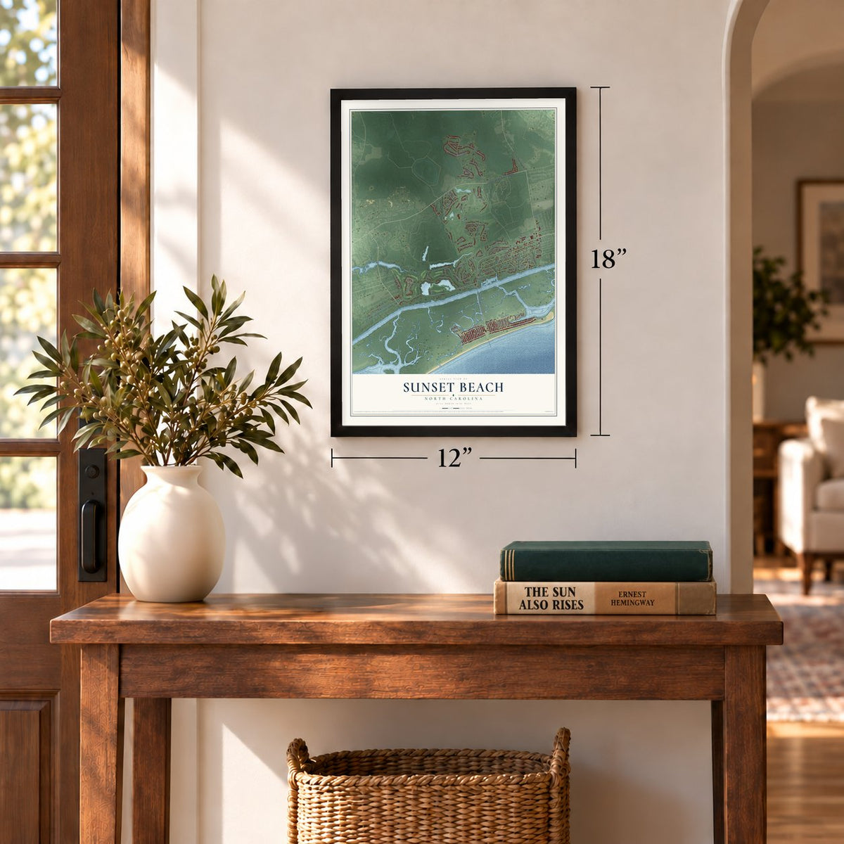 Sunset Beach, North Carolina map, 12 x 18 inch print in a black frame in an entryway