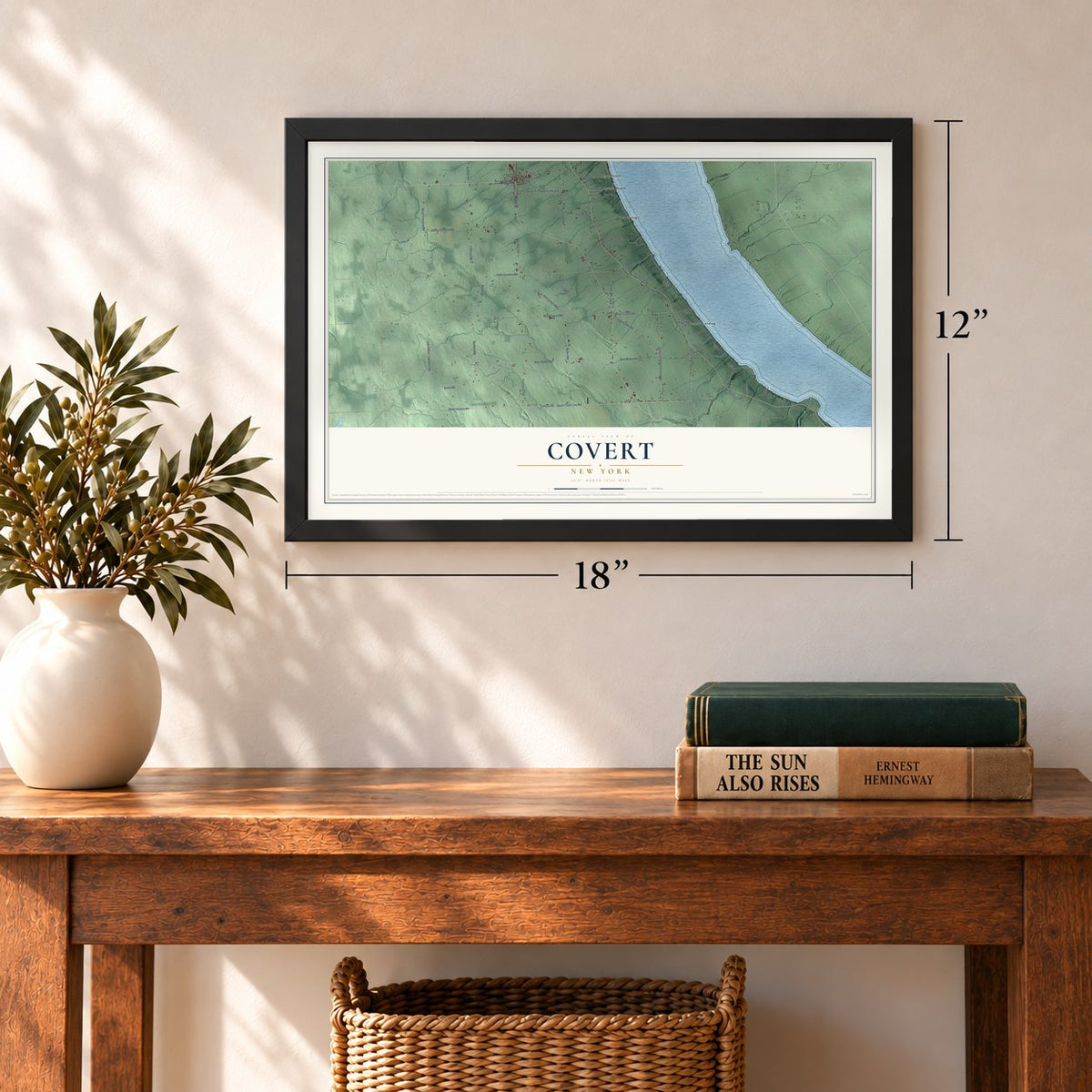 Covert, New York map, 12 x 18 inch print in a black frame in an entryway