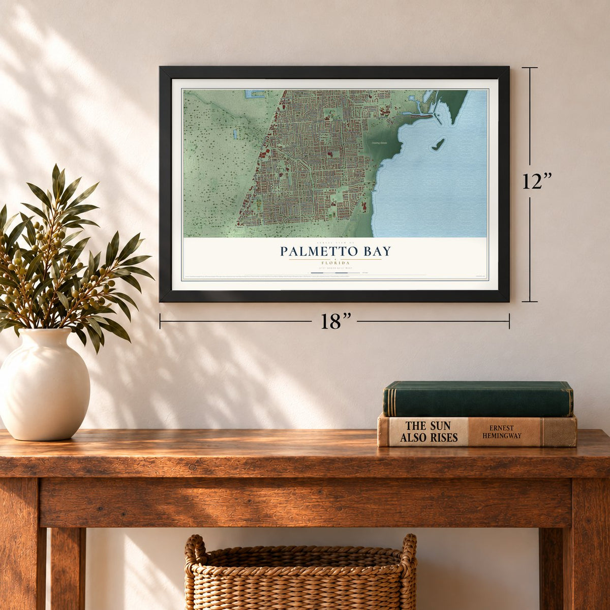 Palmetto Bay, Florida map, 12 x 18 inch print in a black frame in an entryway